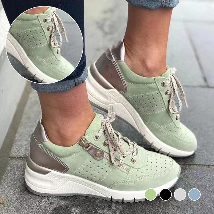 "Damsneakers med elastisk sula, andningsbar grön ovandel, stilren och bekväm design för moderna kvinnor."