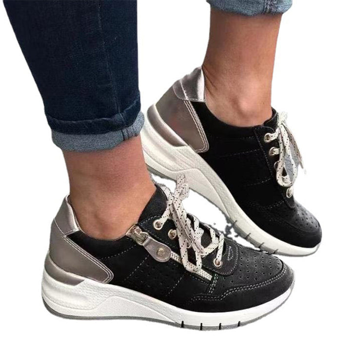"Damsneakers med elastisk sula, andningsbar grön ovandel, stilren och bekväm design för moderna kvinnor."