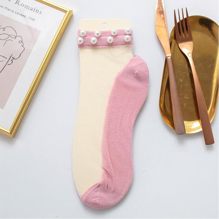 "Damsockor ankel i mjukt silke, andningsbara och lätta, i flera färger, eleganta och elastiska för optimal passform."