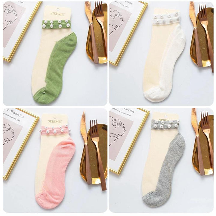 "Damsockor ankel i mjukt silke, andningsbara och lätta, i flera färger, eleganta och elastiska för optimal passform."