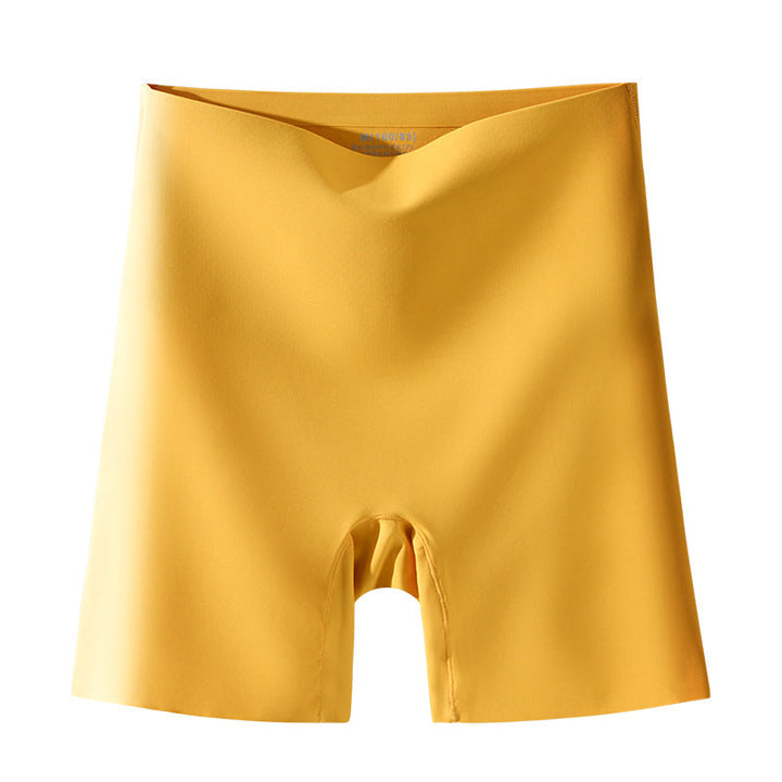 "Damspecifika sömlösa slipshorts i beige, eleganta och anti-skav med komfortabel passform och lätt kompression."