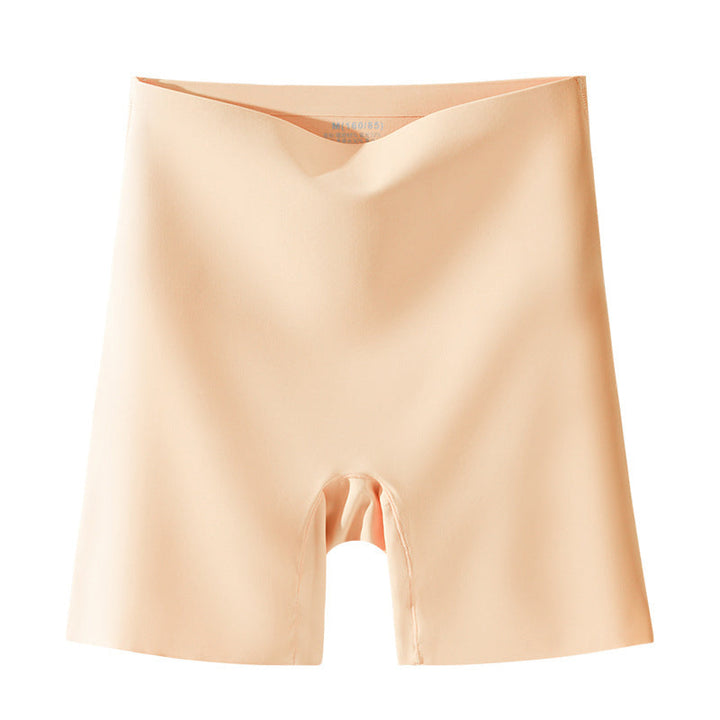 "Damspecifika sömlösa slipshorts i beige, eleganta och anti-skav med komfortabel passform och lätt kompression."
