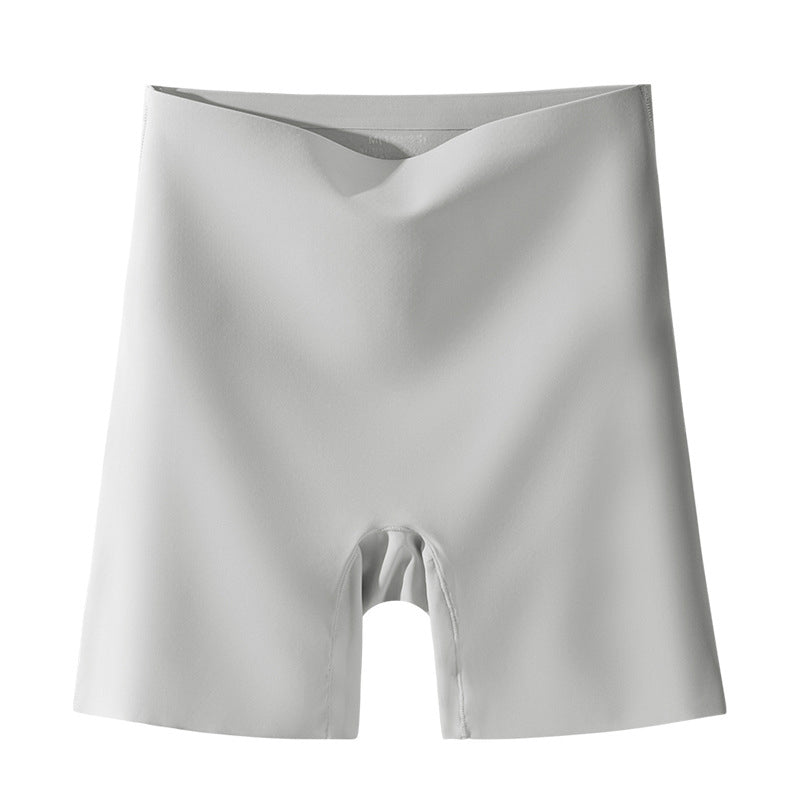 "Damspecifika sömlösa slipshorts i beige, eleganta och anti-skav med komfortabel passform och lätt kompression."