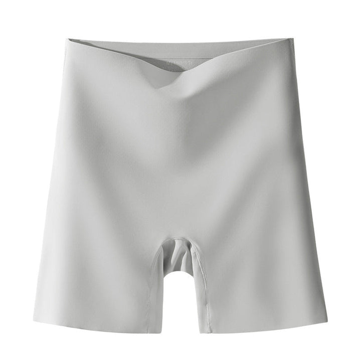 "Damspecifika sömlösa slipshorts i beige, eleganta och anti-skav med komfortabel passform och lätt kompression."