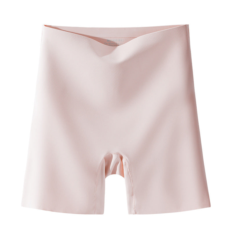 "Damspecifika sömlösa slipshorts i beige, eleganta och anti-skav med komfortabel passform och lätt kompression."