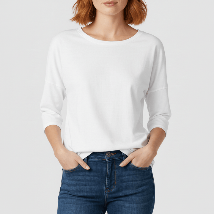 Högkvalitativ damtopp Alyssa. Rundhalsad, trekvartsärm, bekväm och elegant basplagg.