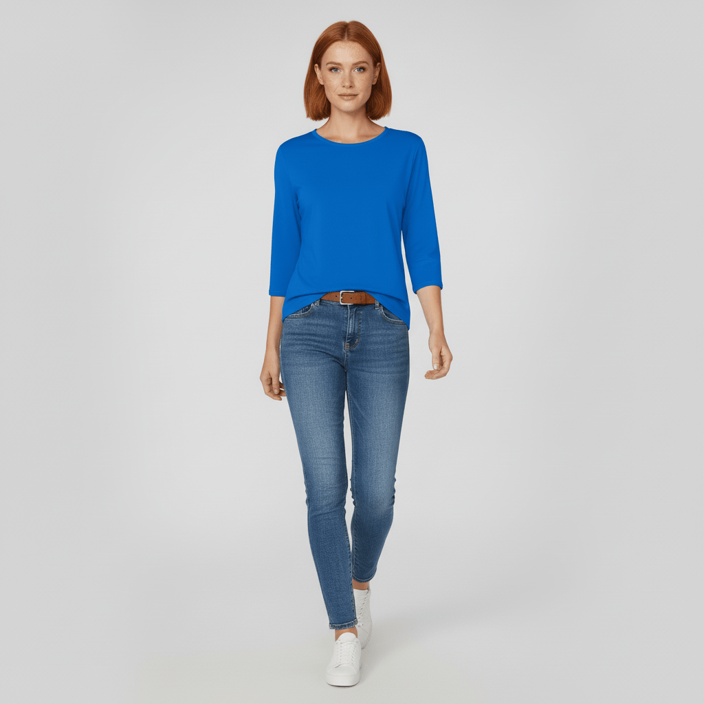 Snygg kvinnlig topp. Rund hals & 3/4 ärm. Bekväm och modern för alla tillfällen.