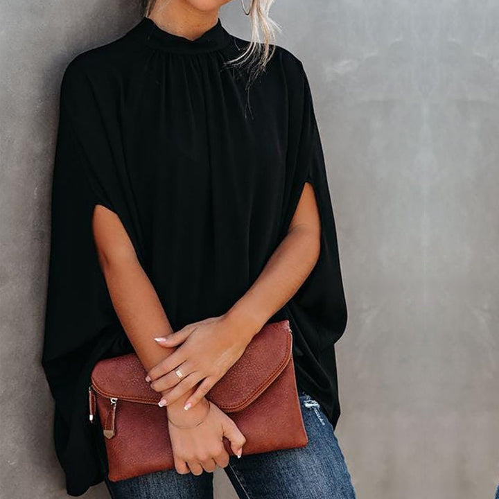 "Damtopp med livfullt tryck, färgglada mönster och dolman ärm för en stilfull och bekväm look, perfekt för alla tillfällen."