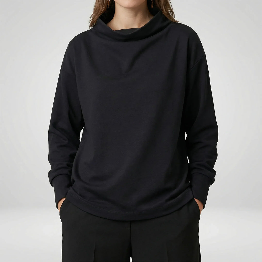 Kvinnas murgrönsgröna pullover, vid passform. En bekväm damtröja perfekt för höstmode och avslappnade dagar.