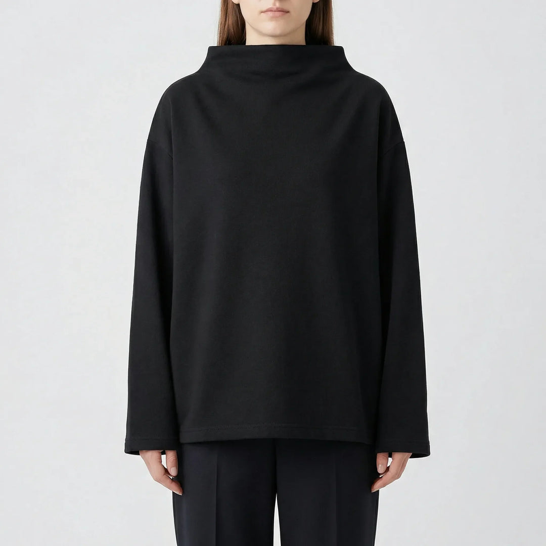Elegant casual damtröja i murgrönsgrönt med rymlig vid passform. En stilren pullover för alla tillfällen.