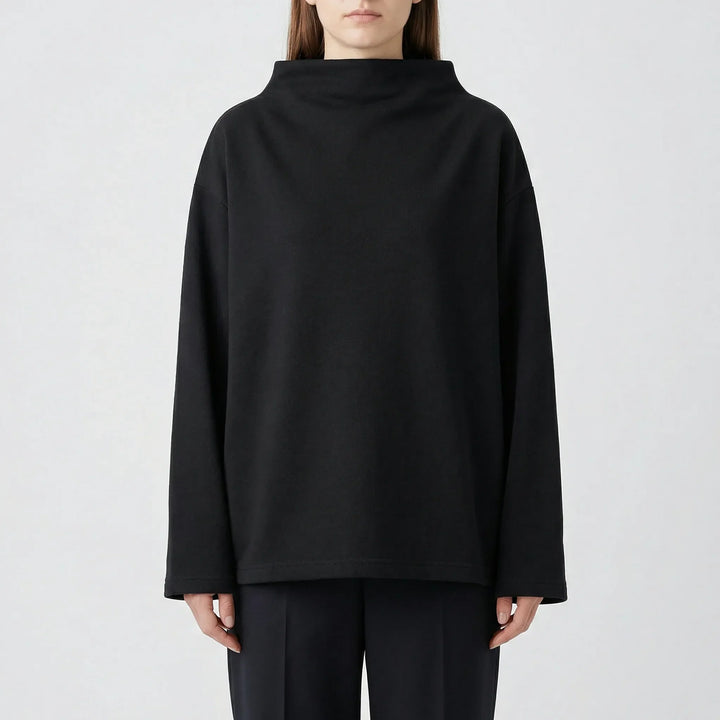 Elegant casual damtröja i murgrönsgrönt med rymlig vid passform. En stilren pullover för alla tillfällen.