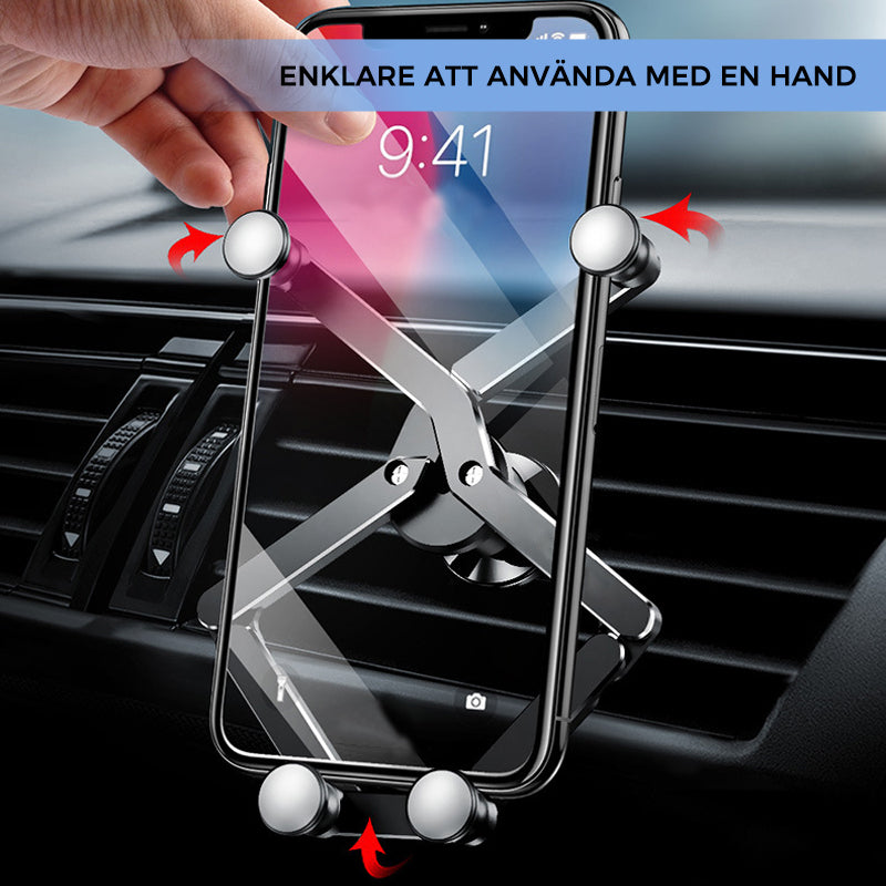 "Deformerande biltelefonhållare i svart, monterad i bilventilation, visar 360° rotation för enkel justering och sikt."
