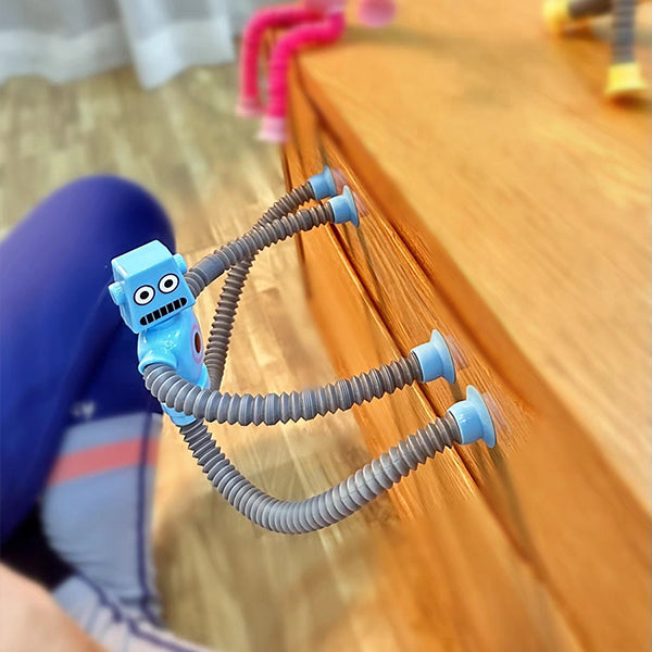 "Deformerbar robotleksak med sugkopp, färgglad design, flexibel form, passar barn och tonåringar, pedagogisk leksak."
