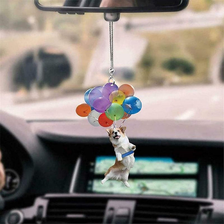 Dekorativ hundbilhänge i glimmerplast, hänger från bilspegeln, ljus och livfull design, ger bil en personlig touch.