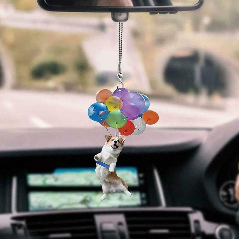 Dekorativ hundbilhänge i glimmerplast, hänger från bilspegeln, ljus och livfull design, ger bil en personlig touch.