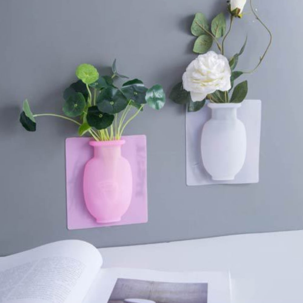 "Dekorativ magisk silikonvas med stark adsorption, i färgerna blå, rosa och vit, 14.5x14.5 cm för släta ytor."