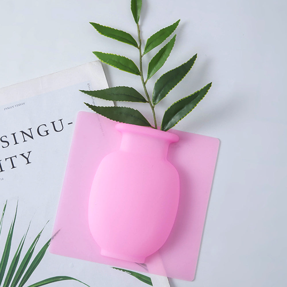 "Dekorativ magisk silikonvas med stark adsorption, i färgerna blå, rosa och vit, 14.5x14.5 cm för släta ytor."
