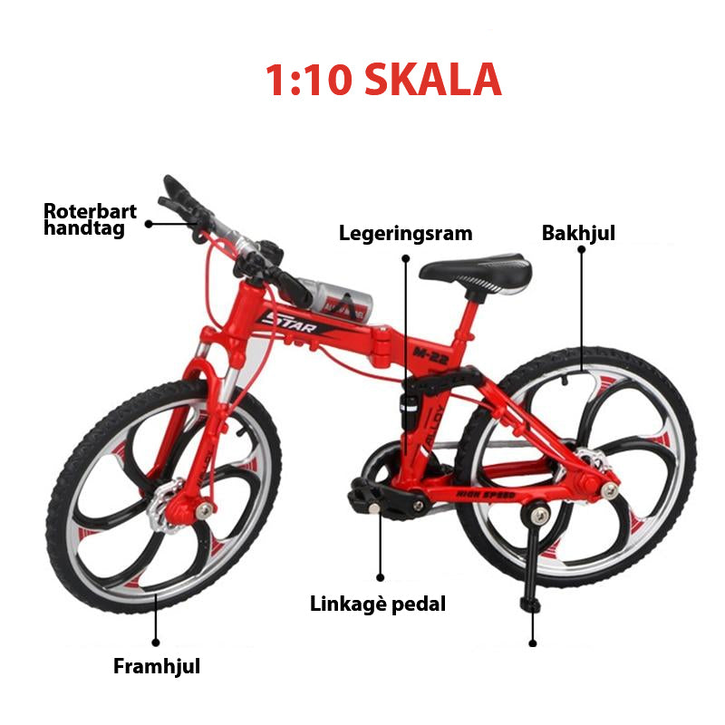 "Detaljerad metall cykelmodell 1:10 leksak, silverfärg, med realistiska detaljer och roterbara hjul för samlare."