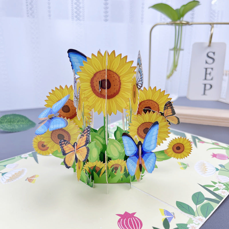 "Detaljerat 3D-handgjort blomsterkort på stativ, perfekt som present eller dekoration för alla tillfällen."