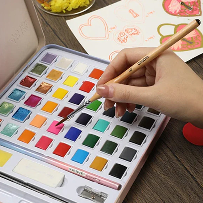 "Detaljpenselsats med 11 precisionsborstar, ergonomiska trähantag, perfekt för konstmålning och modellering."