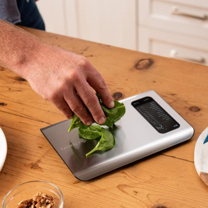 Högprecisions digital köksvåg i rostfritt stål. För exakta mått vid bakning och matlagning.