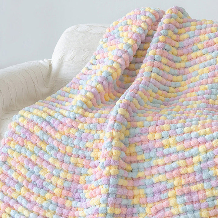 "DIY flätad pärla grov ull i ljusa färger, perfekt för vinterstickning. Mjukt, hållbart material för accessoarer."