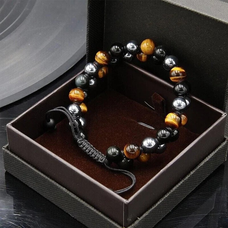 "Dubbel skikt kristallarmband med tigeröga, svart obsidian och hematit för både män och kvinnor, stilrent och elegant."
