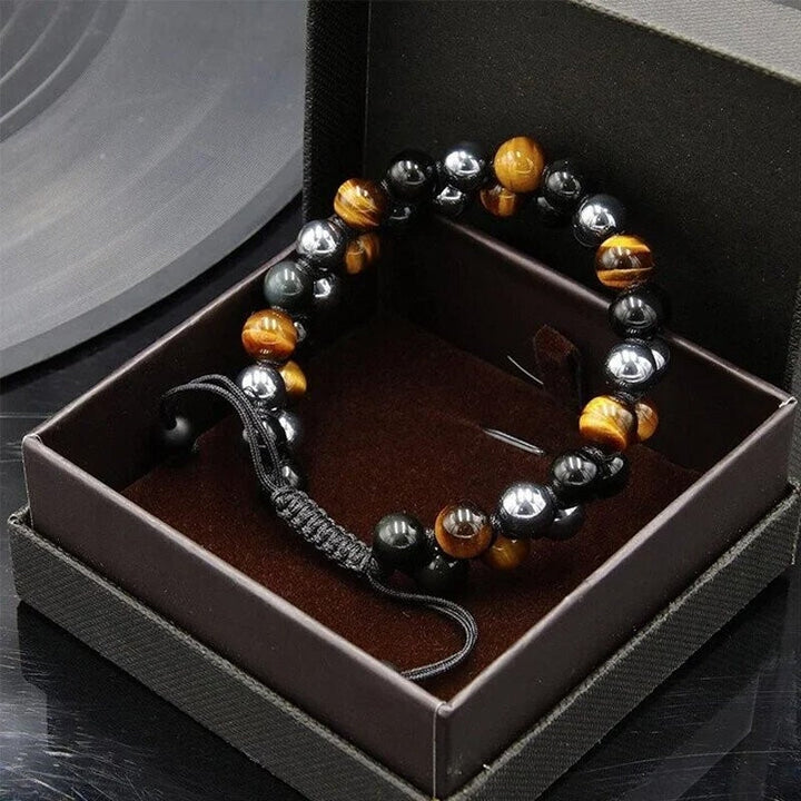 "Dubbel skikt kristallarmband med tigeröga, svart obsidian och hematit för både män och kvinnor, stilrent och elegant."