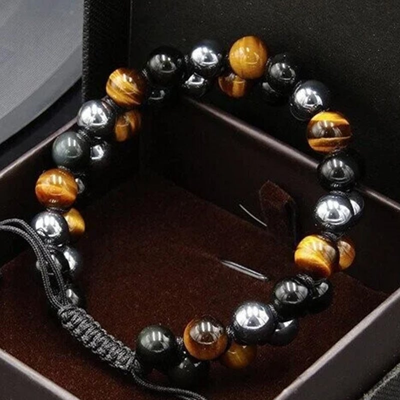 "Dubbel skikt kristallarmband med tigeröga, svart obsidian och hematit för både män och kvinnor, stilrent och elegant."