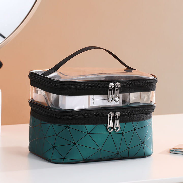 "Dubbellagers kosmetikaväska i transparent TPU med rymligt fack, dubbla dragkedjor och elegant design för sminkförvaring."