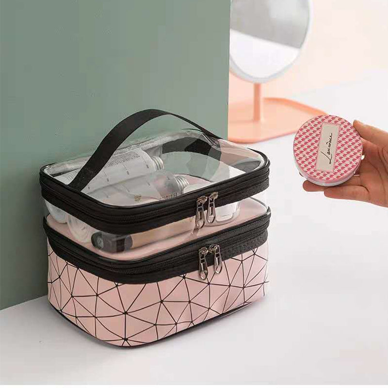 "Dubbellagers kosmetikaväska i transparent TPU med rymligt fack, dubbla dragkedjor och elegant design för sminkförvaring."
