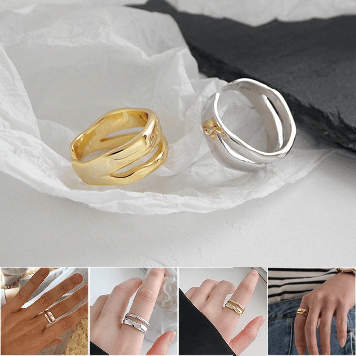 "Dubbelsidig justerbar ring för kvinnor med geometriska former, elegant design i vitguld, guld och silver."