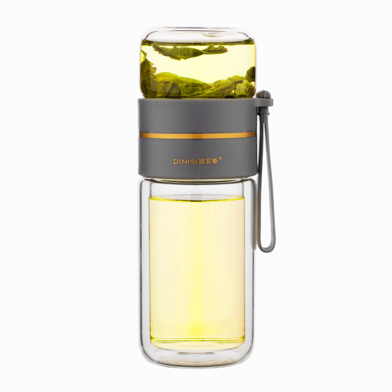 Elegant teflaska i dubbelväggigt glas med finmaskig tesil för löst te.