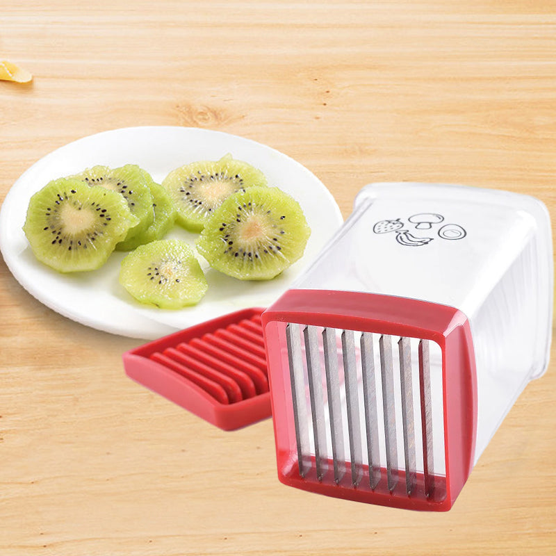 Effektiv hastighetsskivare i kök med robust rostfritt stål och tryckplatta, idealisk för snabb frukt- och grönsaksskivning.