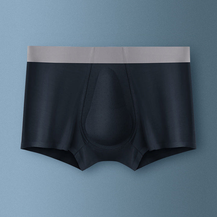 "Ekologiska bomullsboxershorts för män i svart, grå och blå, med stödpaneler för komfort och modern stil."