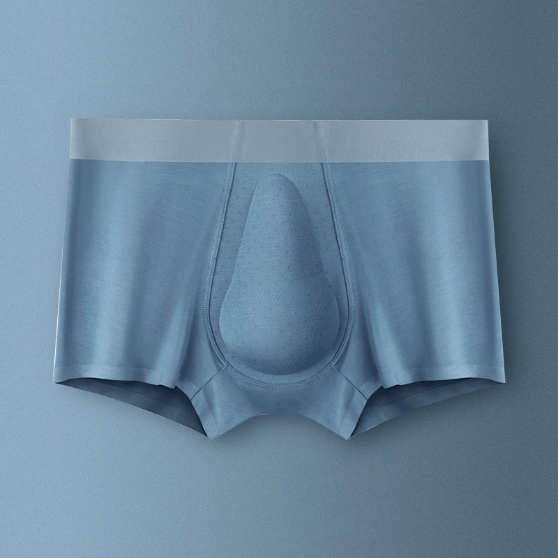 "Ekologiska bomullsboxershorts för män i svart, grå och blå, med stödpaneler för komfort och modern stil."