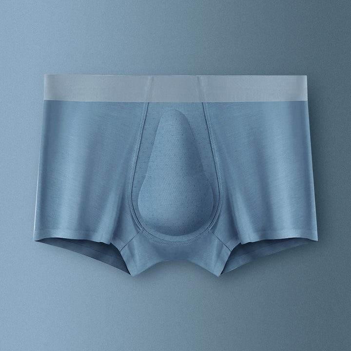 "Ekologiska bomullsboxershorts för män i svart, grå och blå, med stödpaneler för komfort och modern stil."