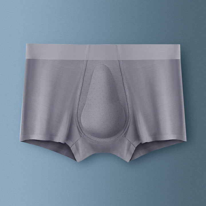 "Ekologiska bomullsboxershorts för män i svart, grå och blå, med stödpaneler för komfort och modern stil."