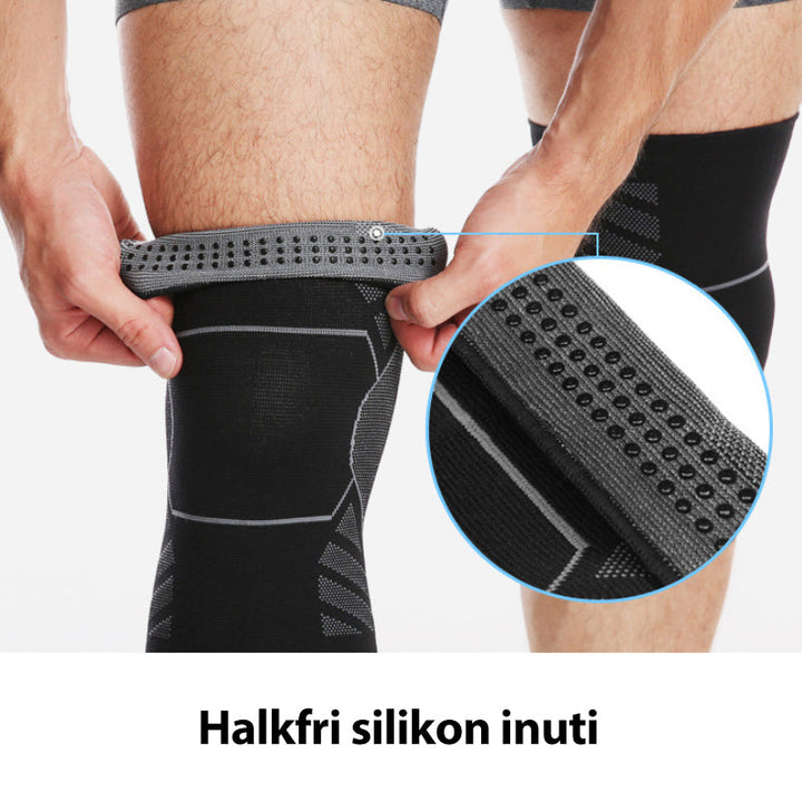 Elastiska knäskydd med halkskydd i svart, bekväma och slitstarka, perfekt för träning och stöd året runt.