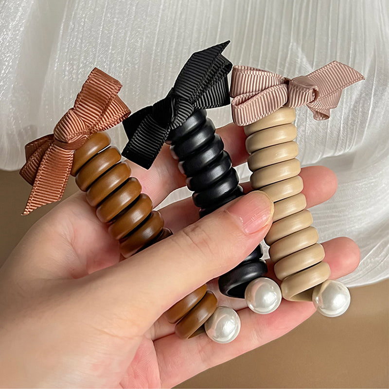 "Elastiskt bowknot hårband för kvinnor, flätad design, flera färger, praktiskt och elegant till vardagsfrisyrer."