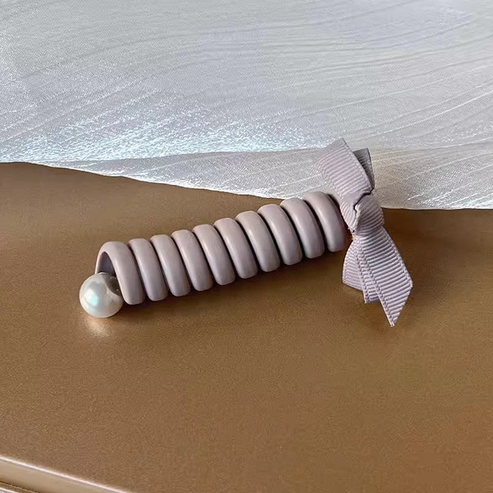 "Elastiskt bowknot hårband för kvinnor, flätad design, flera färger, praktiskt och elegant till vardagsfrisyrer."