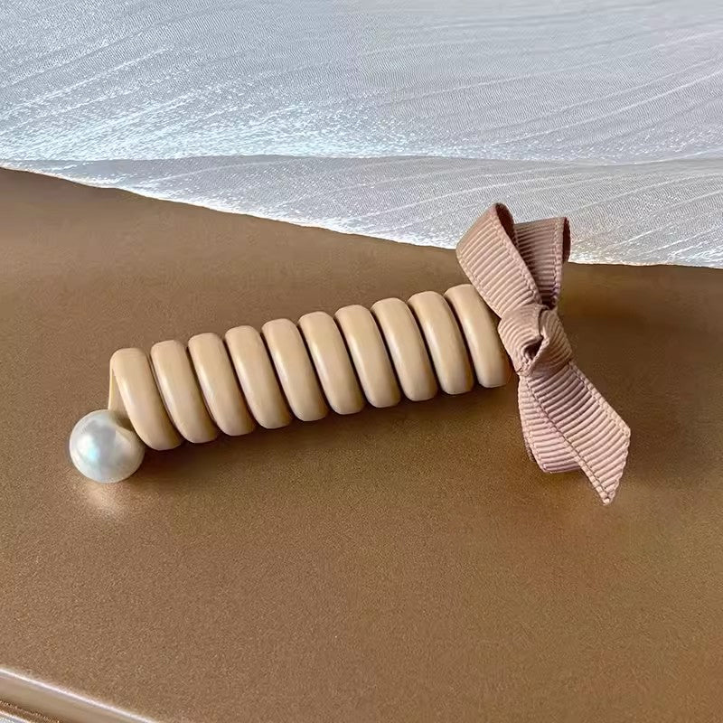 "Elastiskt bowknot hårband för kvinnor, flätad design, flera färger, praktiskt och elegant till vardagsfrisyrer."