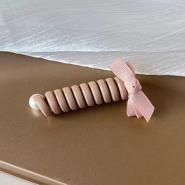 "Elastiskt bowknot hårband för kvinnor, flätad design, flera färger, praktiskt och elegant till vardagsfrisyrer."