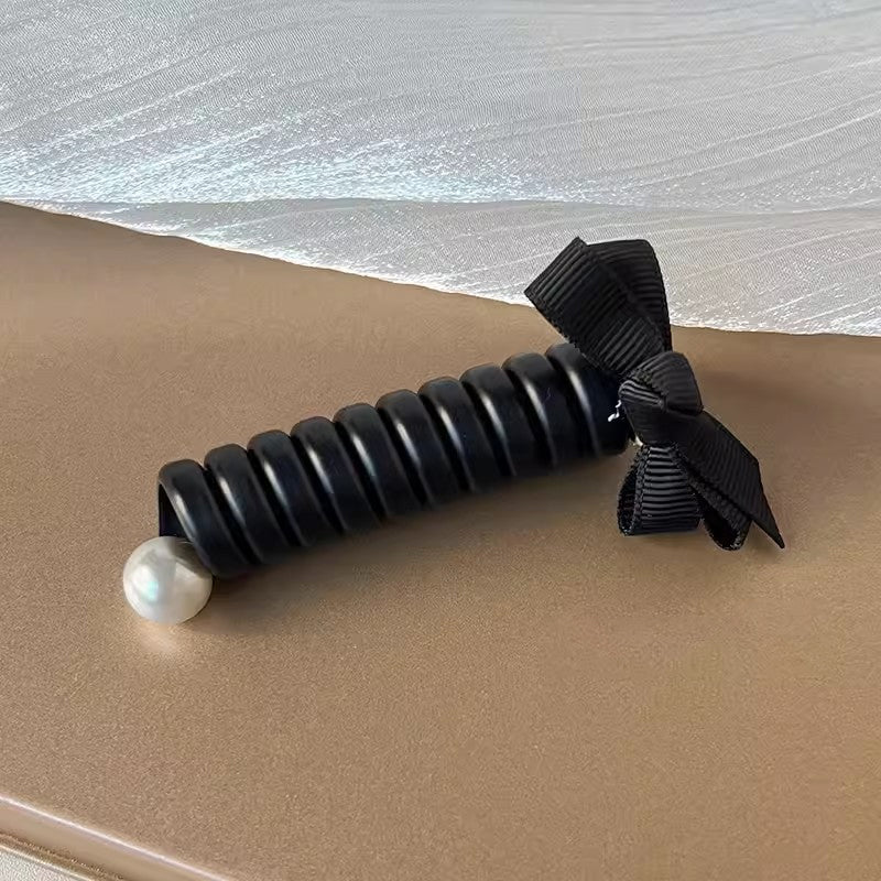 "Elastiskt bowknot hårband för kvinnor, flätad design, flera färger, praktiskt och elegant till vardagsfrisyrer."