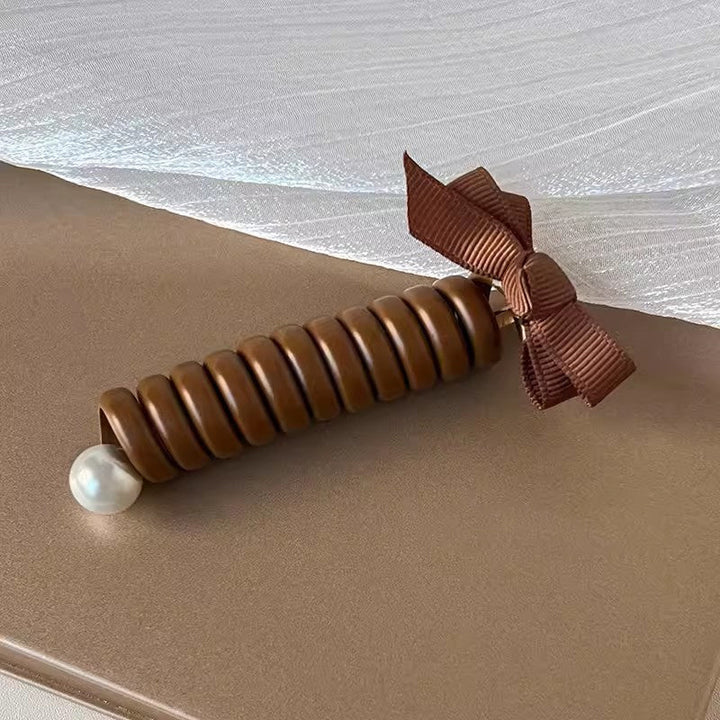 "Elastiskt bowknot hårband för kvinnor, flätad design, flera färger, praktiskt och elegant till vardagsfrisyrer."