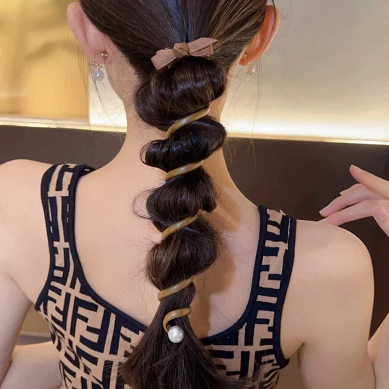 "Elastiskt bowknot hårband för kvinnor, flätad design, flera färger, praktiskt och elegant till vardagsfrisyrer."