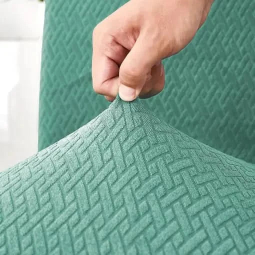 Modernt stolsöverdrag i stretch som förvandlar gamla stolar. Perfekt förnyelse för hemmet.
