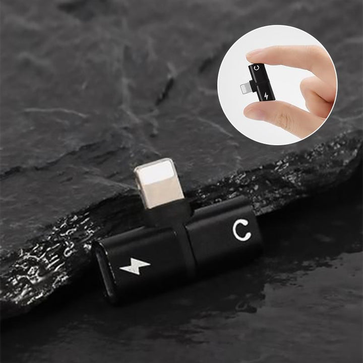 "Elegant 2-i-1 hörlursadapter för iPhone med dubbla portar, kompakt och portabel, för ljud och laddning samtidigt."