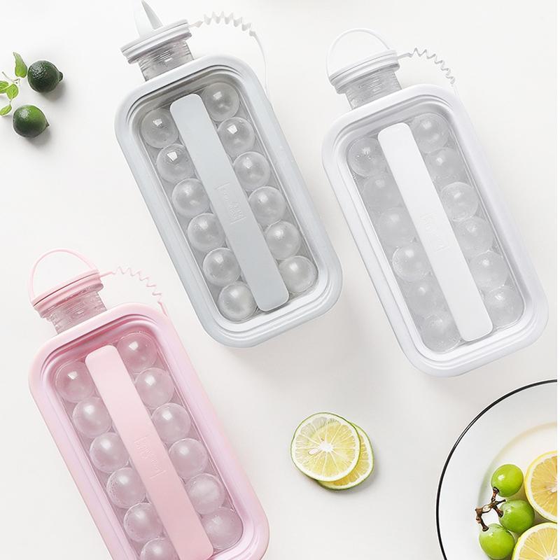 "Elegant 2-i-1 isform och vattenflaska i vit, grå eller rosa med handtag, perfekt för köket och utomhusbruk."