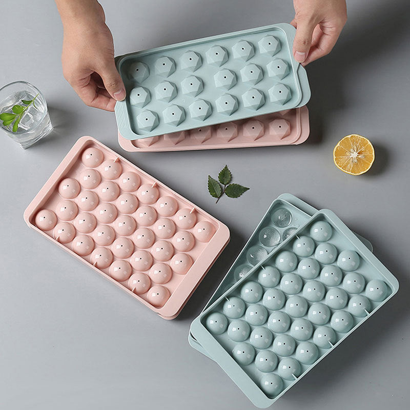 "Elegant 3D-istillverkningsset i blå och rosa för köket, med diamant- och rundformade isformar för unika drinkupplevelser."